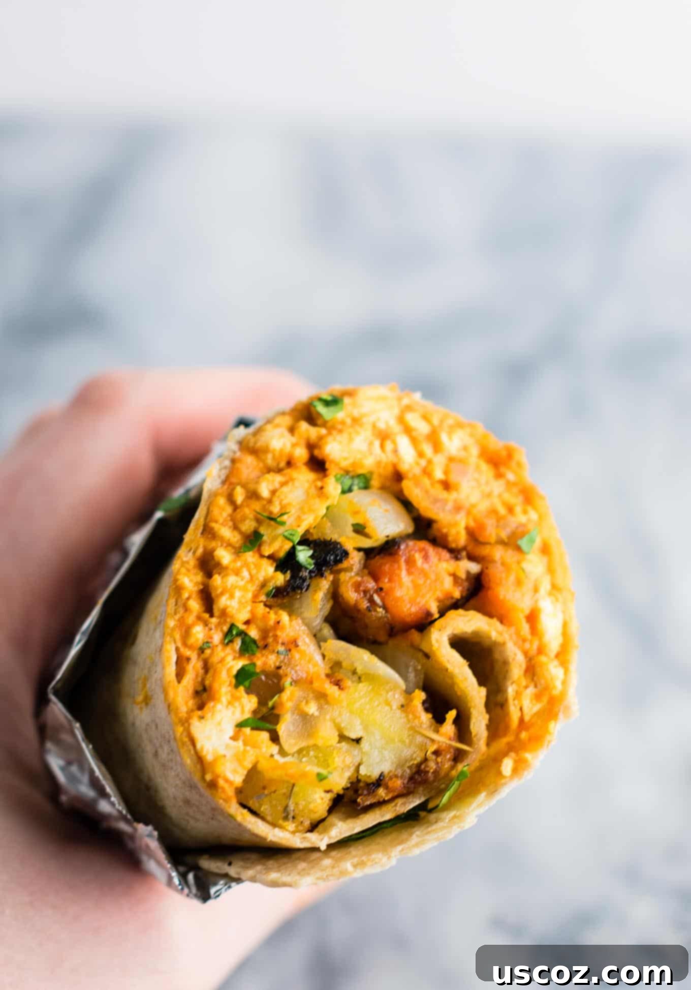 Plant-Based Breakfast Burrito Bliss 4 Fresh ingredients laid out on a cutting board, ready for making vegan breakfast burritos.