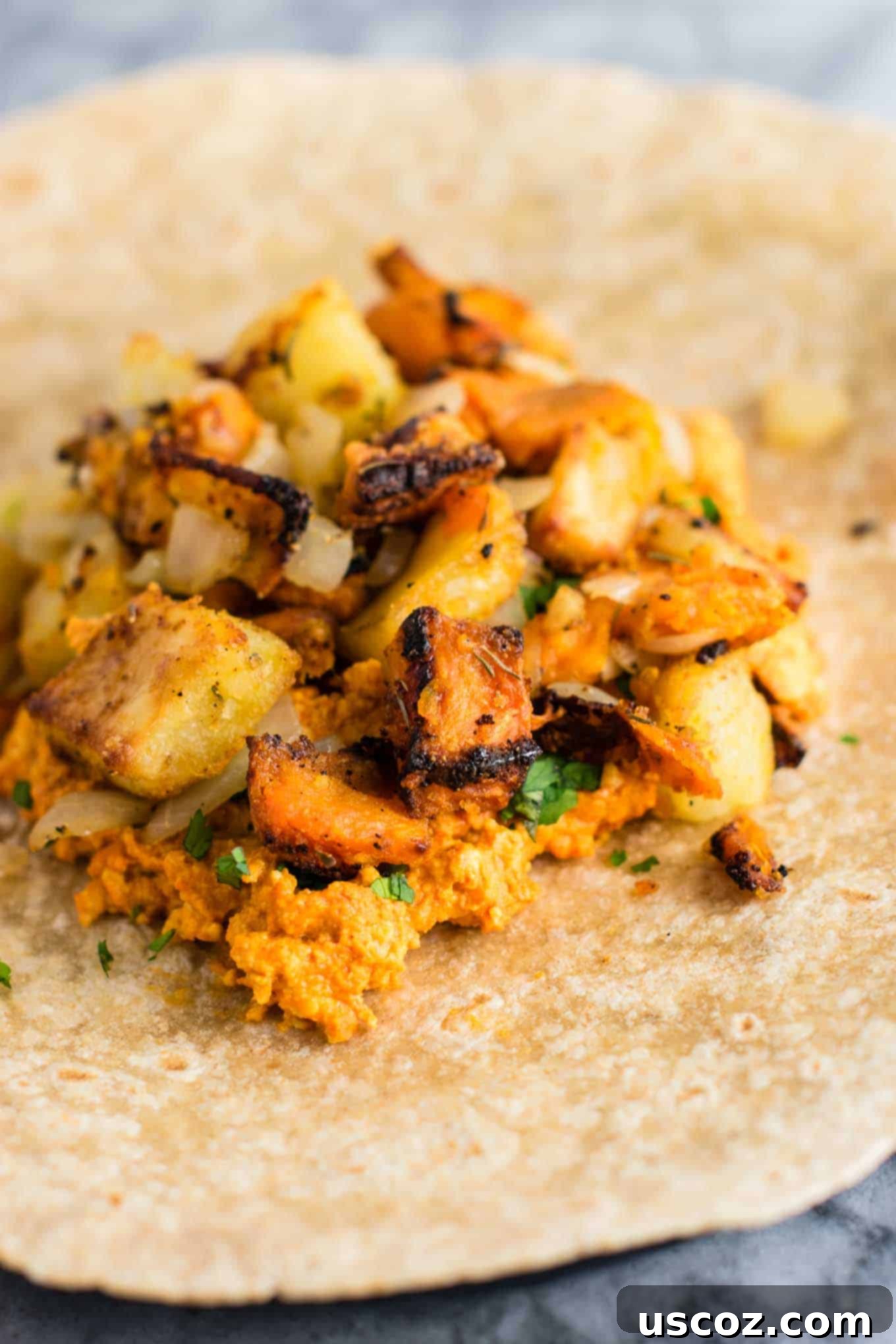 Plant-Based Breakfast Burrito Bliss 7 Crispy roasted potato hash with onions and garlic.