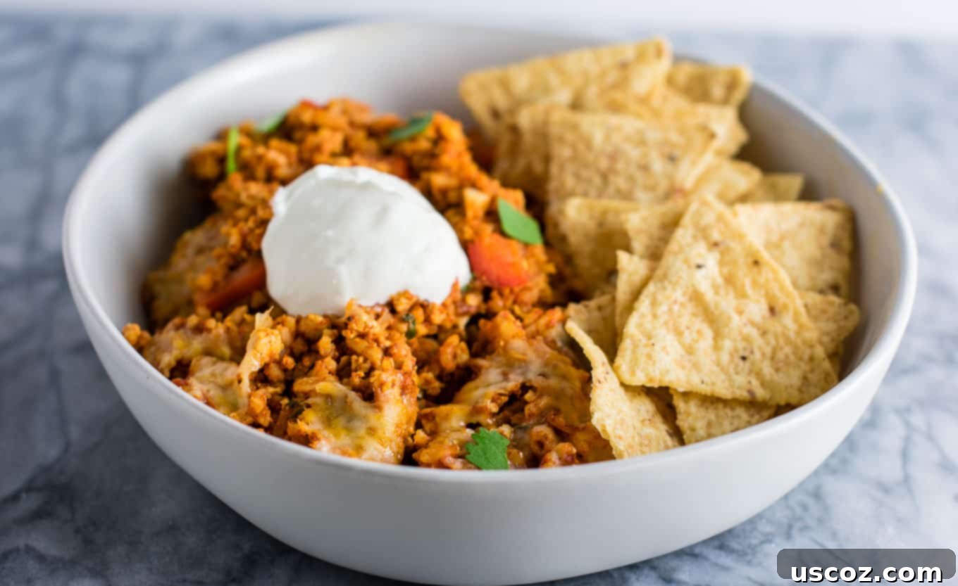 Spicy Mexican Tofu Rice Bake 9 A wide shot of the Tofu Mexican Rice Casserole in a baking dish, ready to be served.