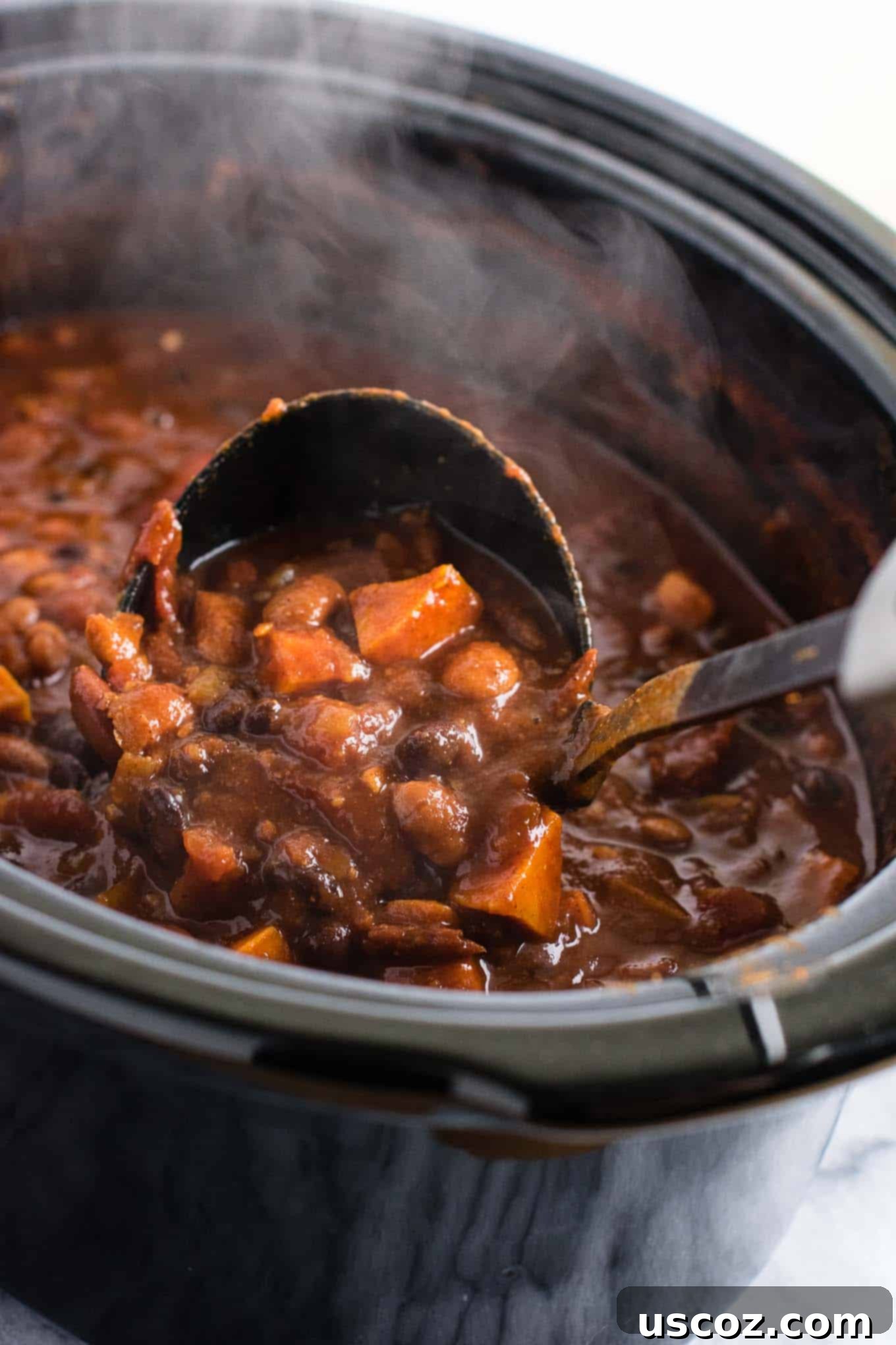 Easy Slow Cooker Vegetarian Sweet Potato Chili 12 Another enticing close-up of the Slow Cooker Vegetarian Sweet Potato Chili, highlighting the rich colors and textures of the beans and sweet potatoes.