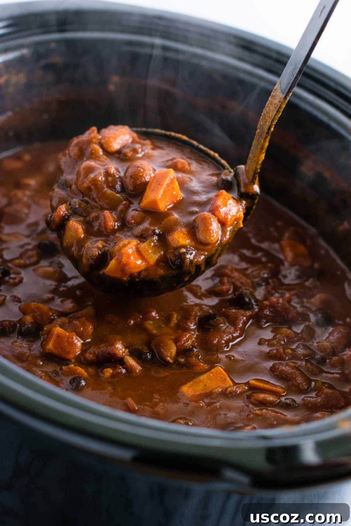 Easy Slow Cooker Vegetarian Sweet Potato Chili 10 Portioned slow cooker vegetarian sweet potato chili cooling in containers in the refrigerator, ready for freezing.