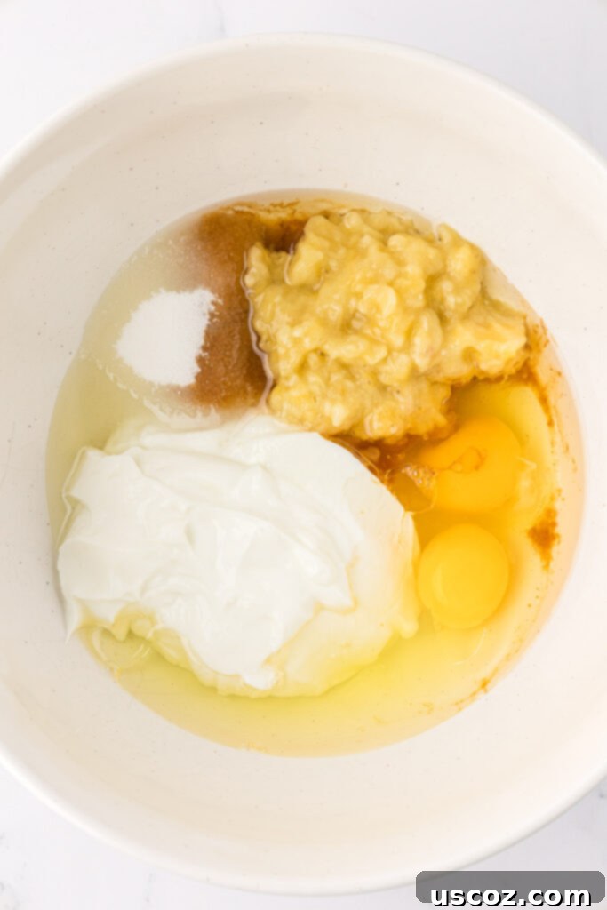 Nourishing Chocolate Muffins 7 Wet ingredients for muffins in a bowl