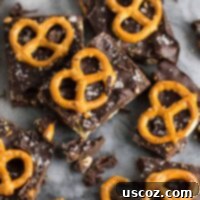 Salty Sweet Vegan Chocolate Pretzel Bark 16 Close-up of a perfectly set piece of Vegan Chocolate Sea Salt Pretzel Bark.