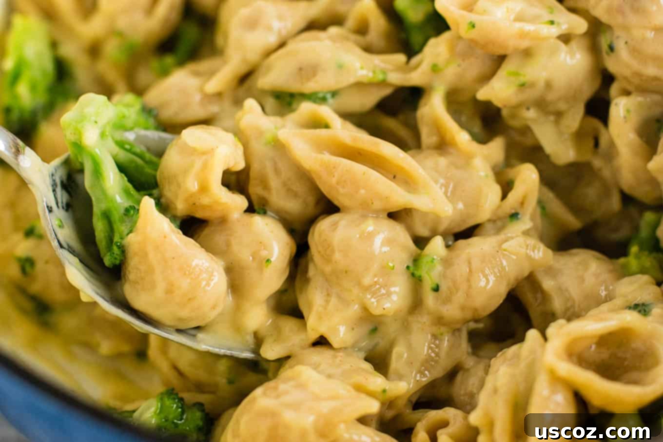 The Ultimate Broccoli Mac and Cheese 8 Lightened up broccoli shells and cheese with sharp cheddar cheese and whole wheat pasta. The healthiest way to justify eating macaroni and cheese for dinner. Kids will love this one! #broccolishellsandcheese #macandcheese #healthy #dinner #vegetarian #meatless #pasta #wholewheat