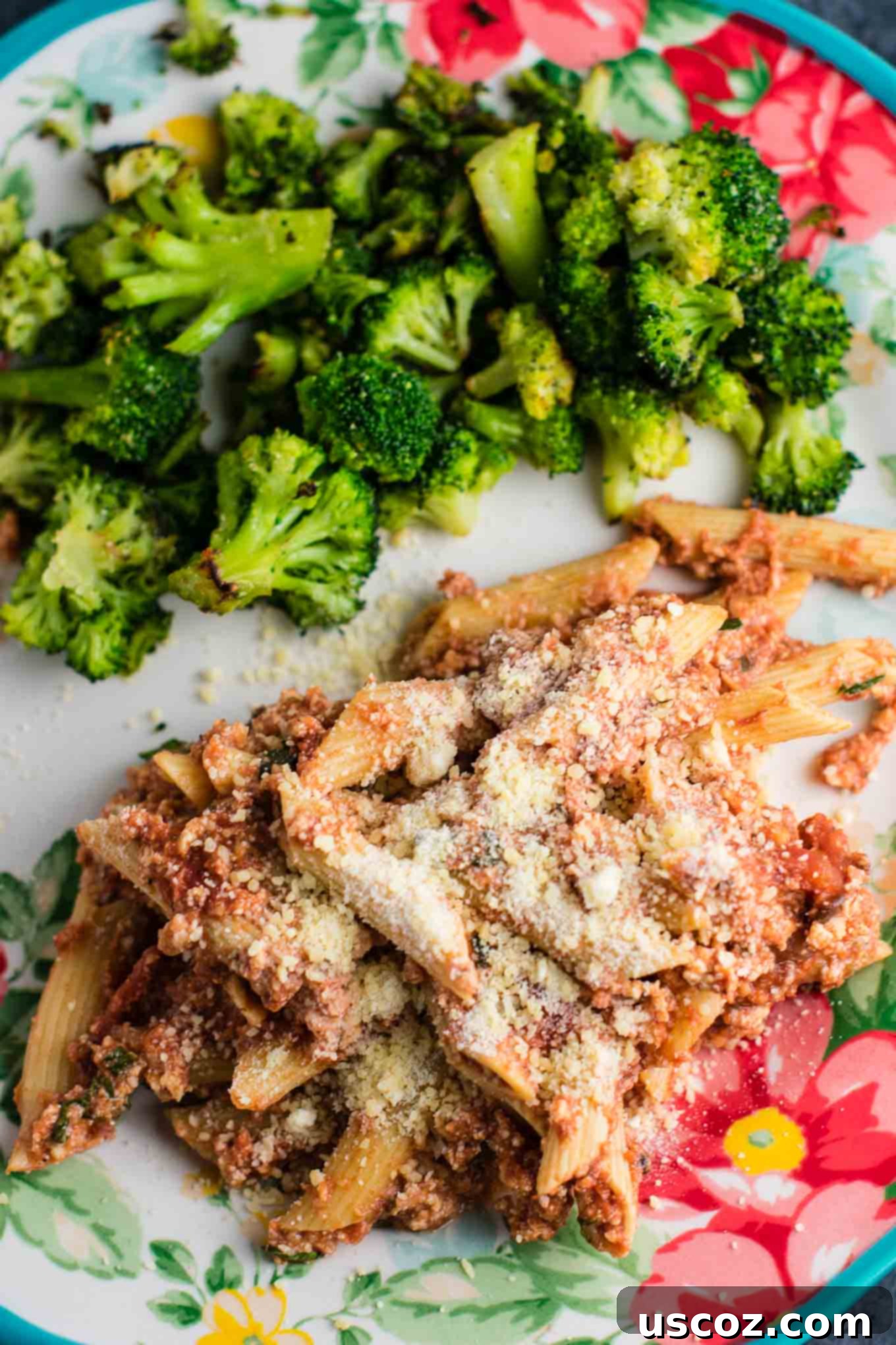 Perfectly Roasted Frozen Broccoli 7 A plate featuring a serving of crock pot ziti paired with crispy roasted broccoli, showcasing a complete meal.