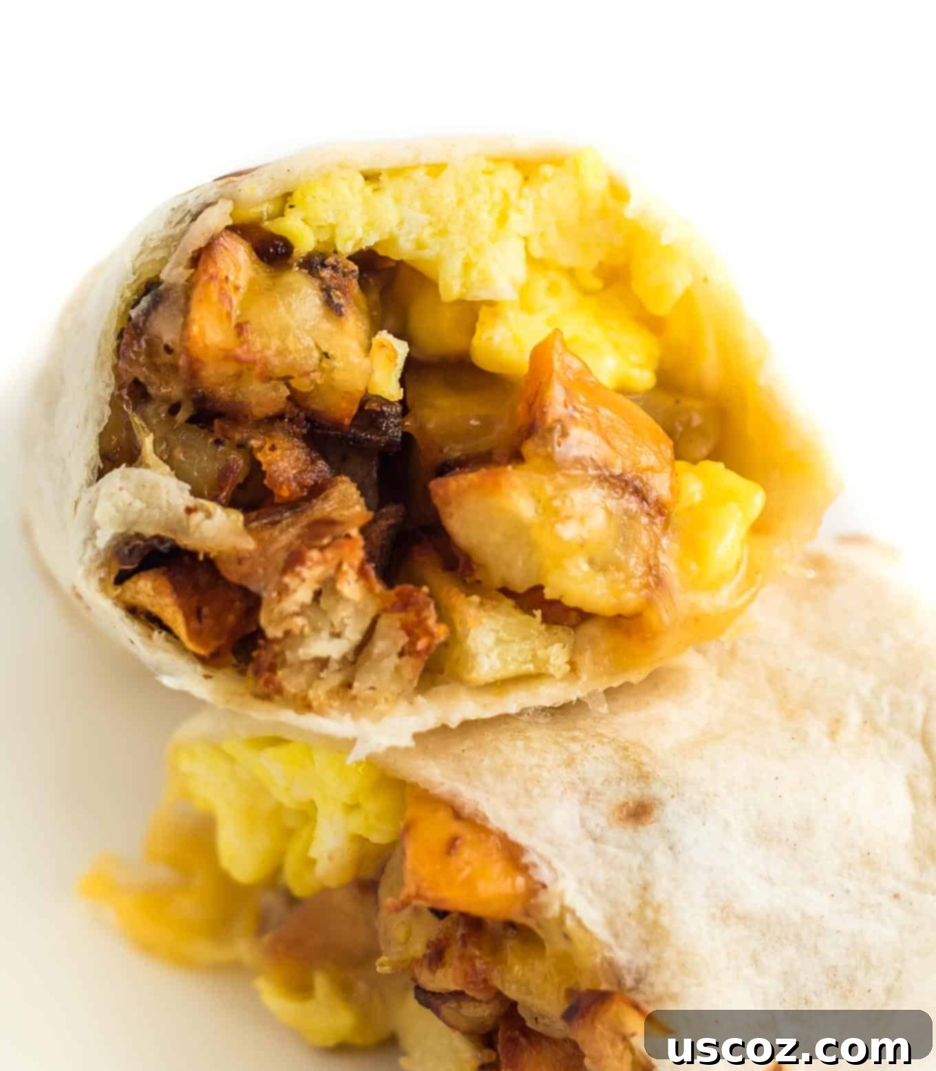 Your New Favorite Breakfast Burrito 3 A breakfast burrito generously stuffed with fluffy scrambled eggs and golden crispy hash