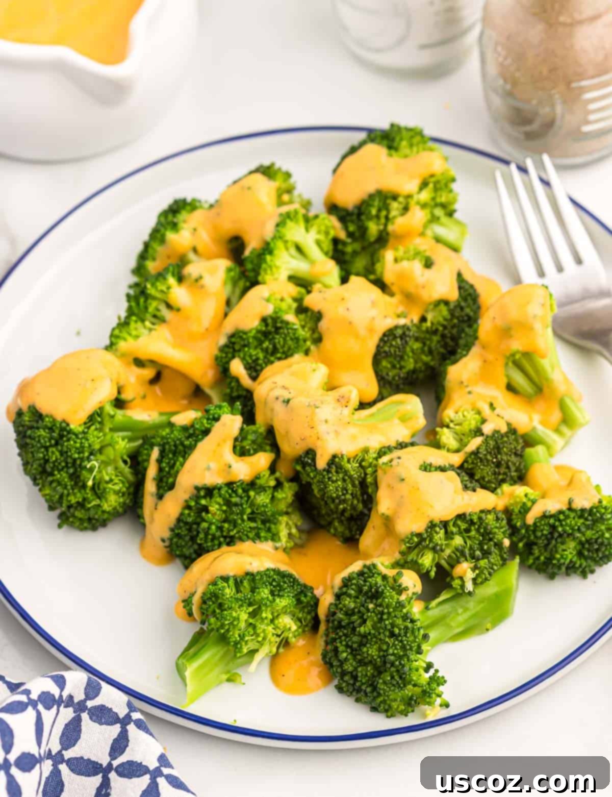 Ultimate Cheesy Broccoli Sauce 2 Delicious cheese sauce coating steamed broccoli florets