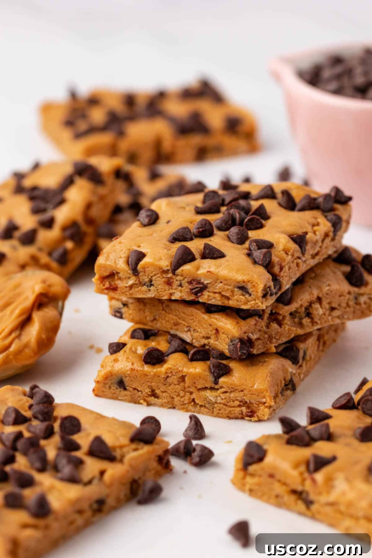 PB & Chocolate Chip Protein Bars 3 Close-up of freshly made peanut butter chocolate chip protein bars.