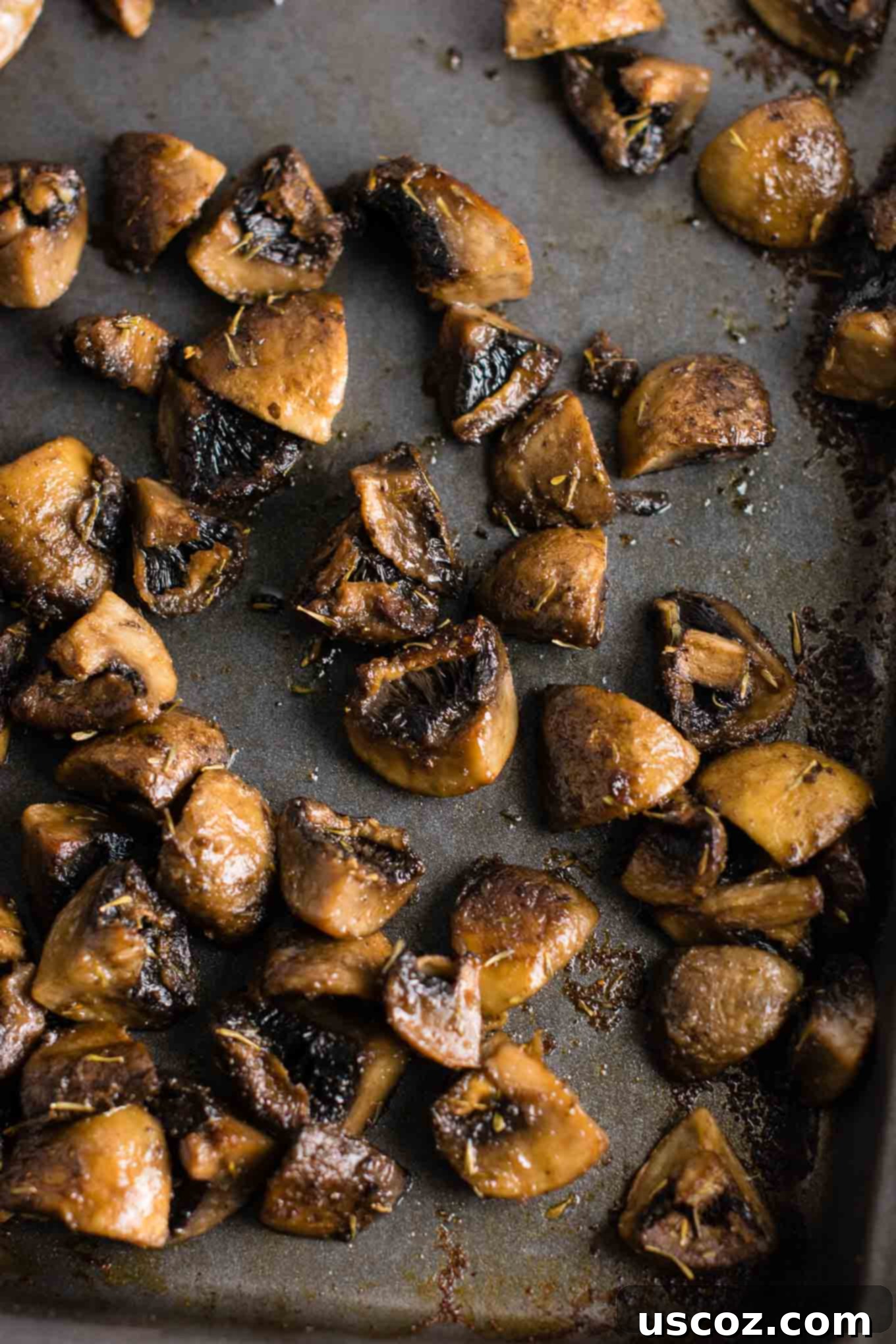 No-Fuss Roasted Mushrooms 5 Close-up of a serving of golden brown, caramelized roasted mushrooms.