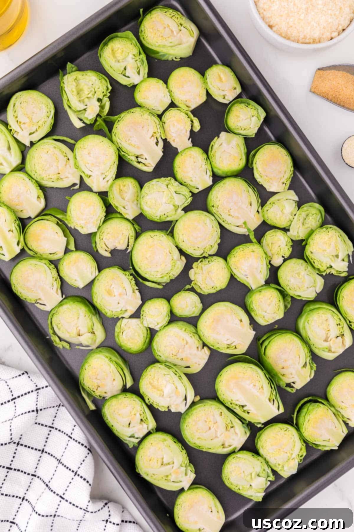 Sprout Leaf Crisps 6 brussels sprouts slices on a baking sheet