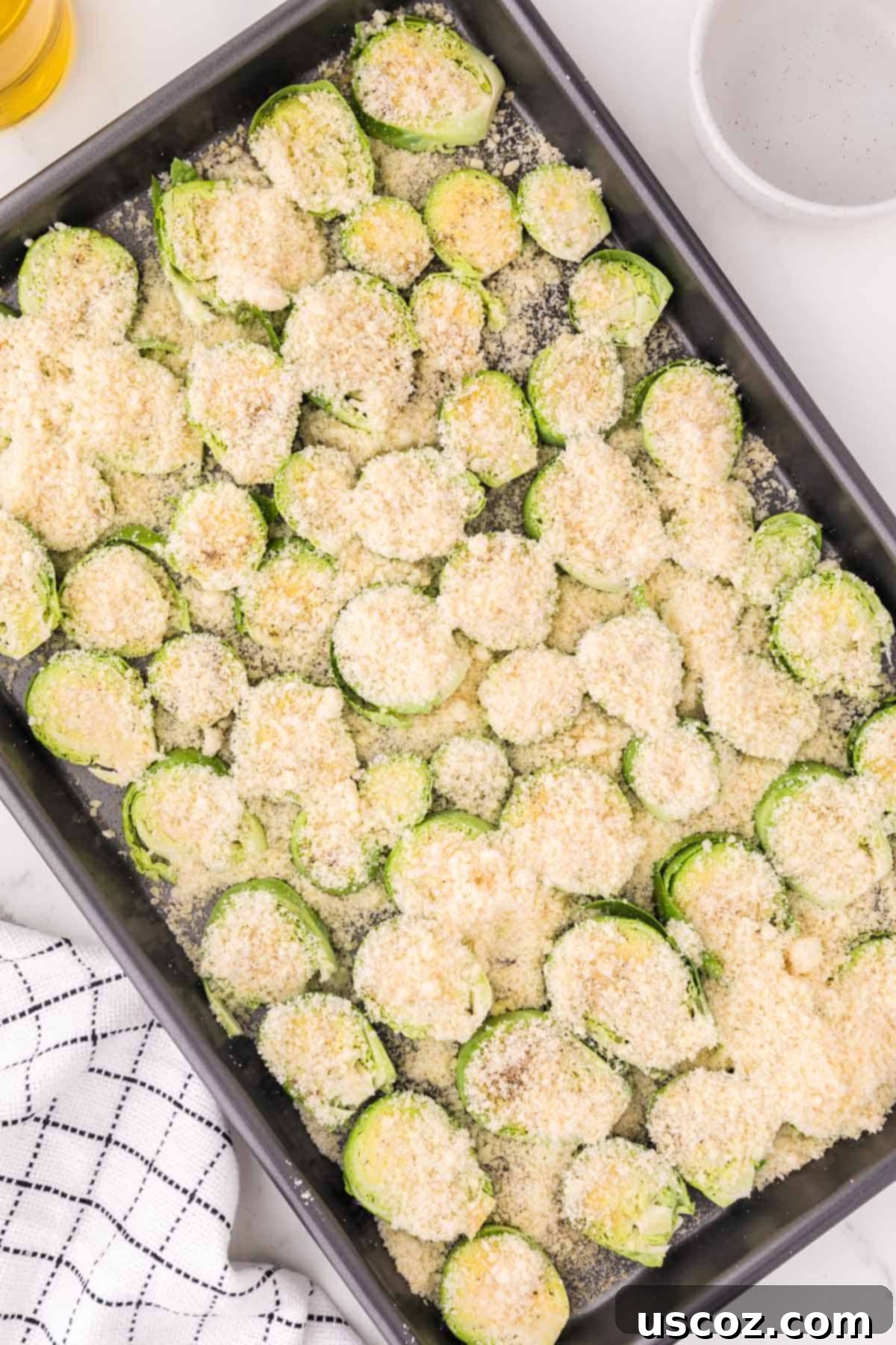 Sprout Leaf Crisps 7 adding parmesan and spices to the brussels sprouts