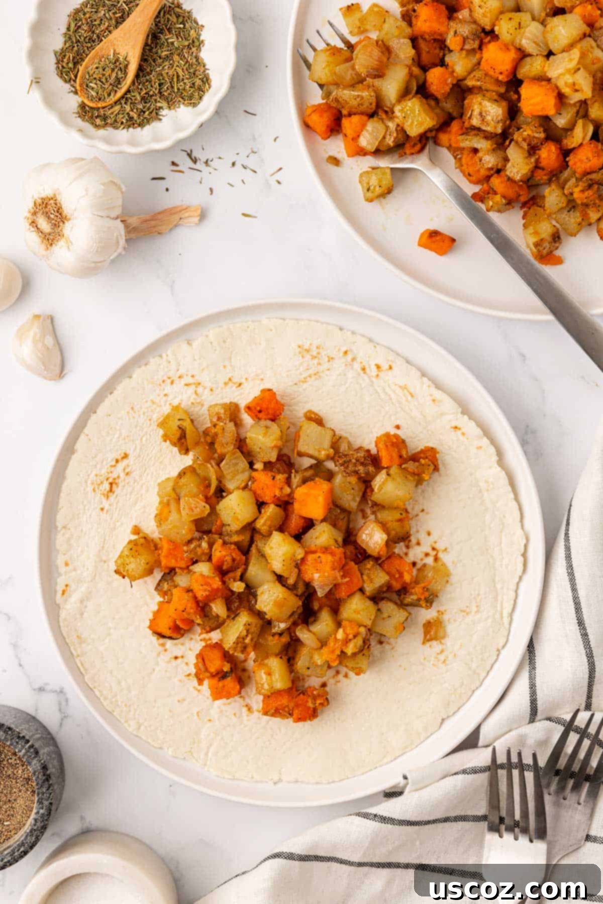 Hearty Vegan Breakfast Hash 11 Vegan breakfast hash served on a tortilla