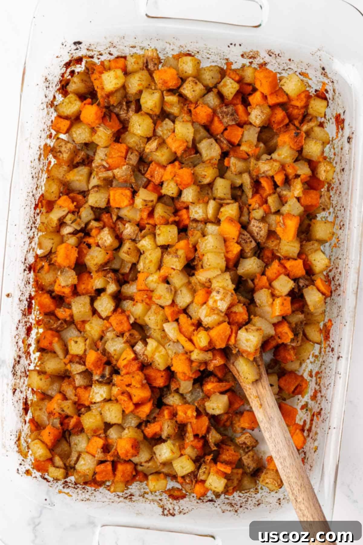 Hearty Vegan Breakfast Hash 9 Freshly mixed vegan breakfast hash in a baking dish