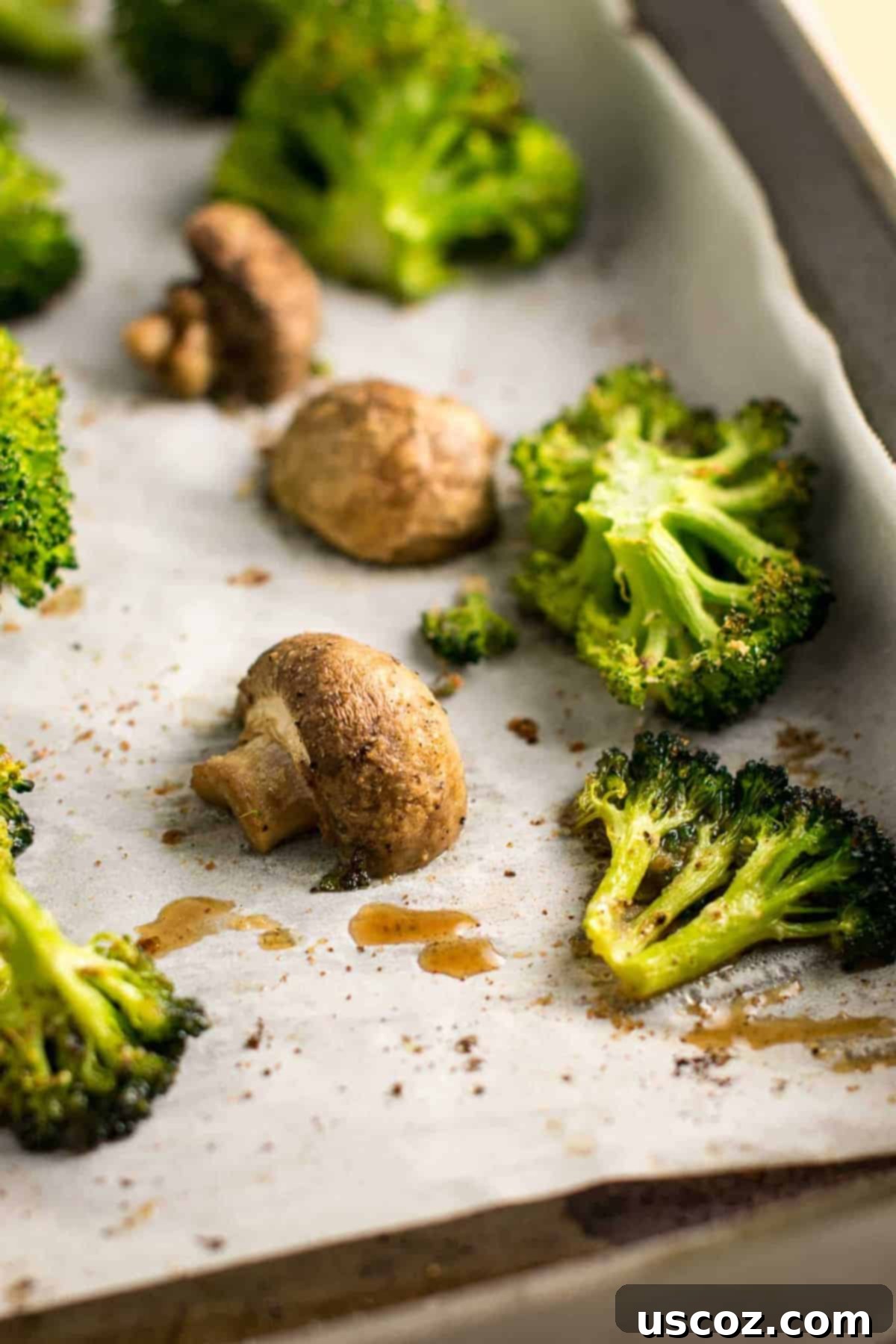 Garlic Herb Roasted Broccoli and Mushrooms 2 Vibrantly colored roasted broccoli and mushrooms perfectly seasoned, presented as a delicious and easy side dish