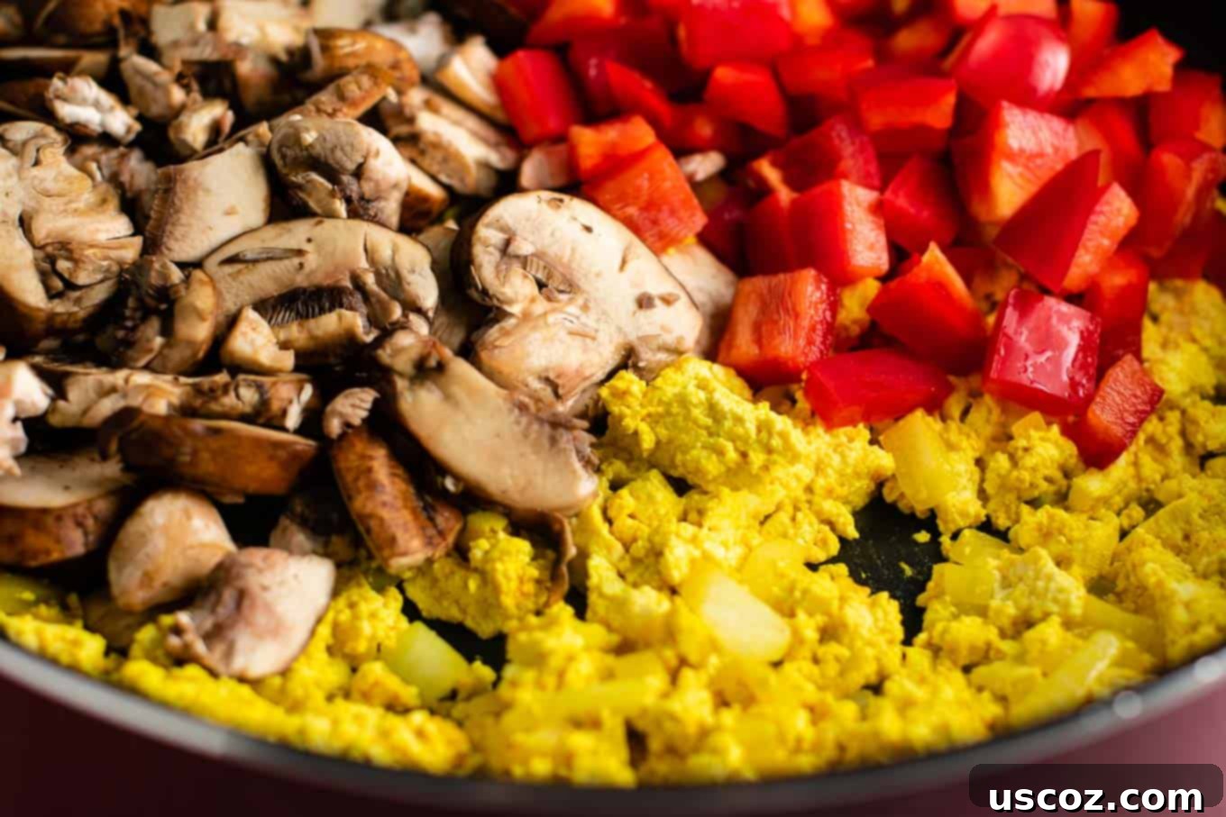 Wholesome Tofu Scramble 8 The finished vegan tofu scramble, perfectly cooked with bell peppers and mushrooms, ready to serve. #tofuscrambled #veganrecipe