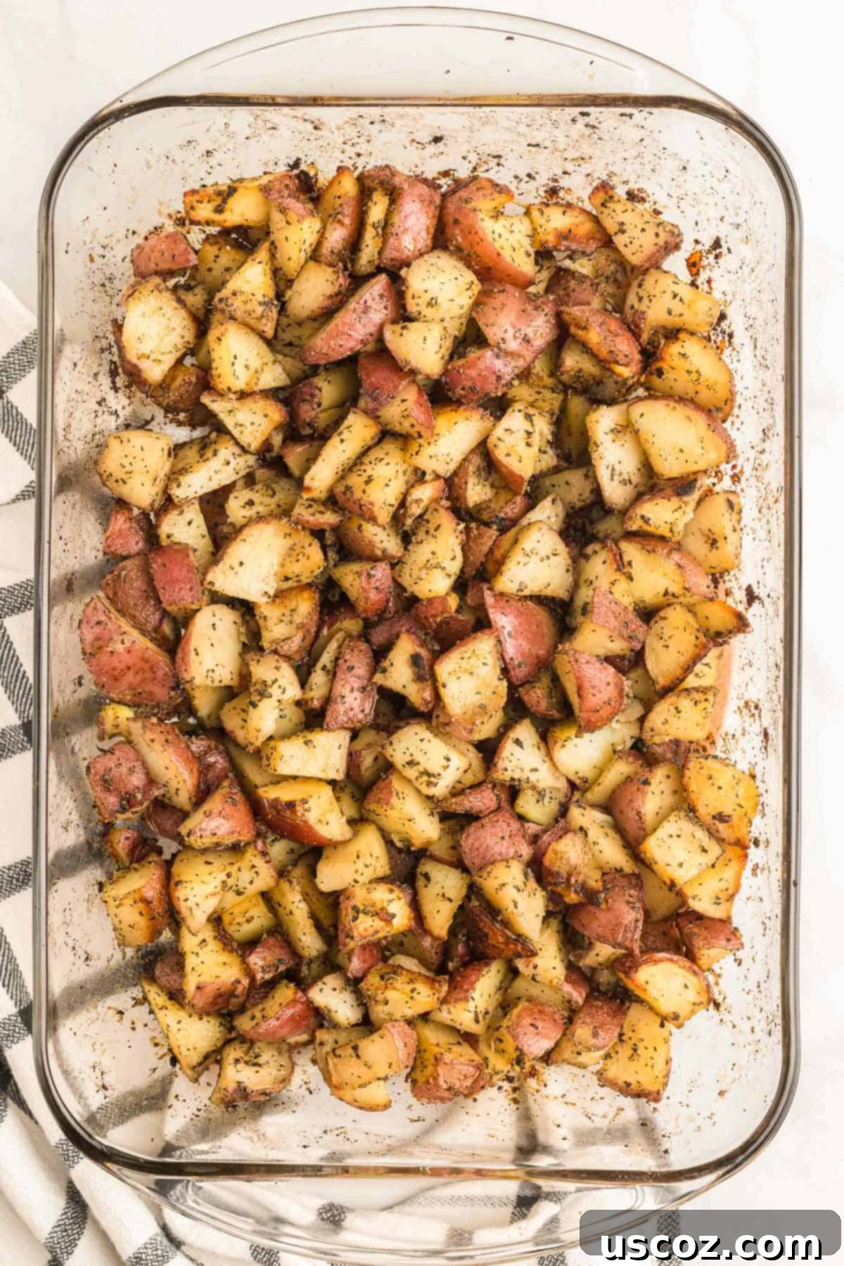 Garlic Herb Roasted Baby Red Potatoes 2 perfectly roasted baby red potatoes on a serving platter, ready to be enjoyed as a side dish