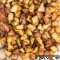 Garlic Herb Roasted Baby Red Potatoes 11 crispy roasted baby red potatoes in a bowl, ready to be served