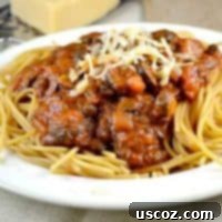 Simple Vegetarian Spaghetti 3 A bowl of easy meatless spaghetti, topped with fresh Parmesan cheese.