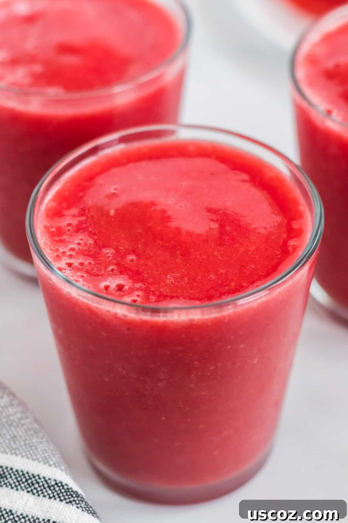 Sweet Summer Smoothie Sensation 6 strawberry watermelon smoothie in a clear glass
