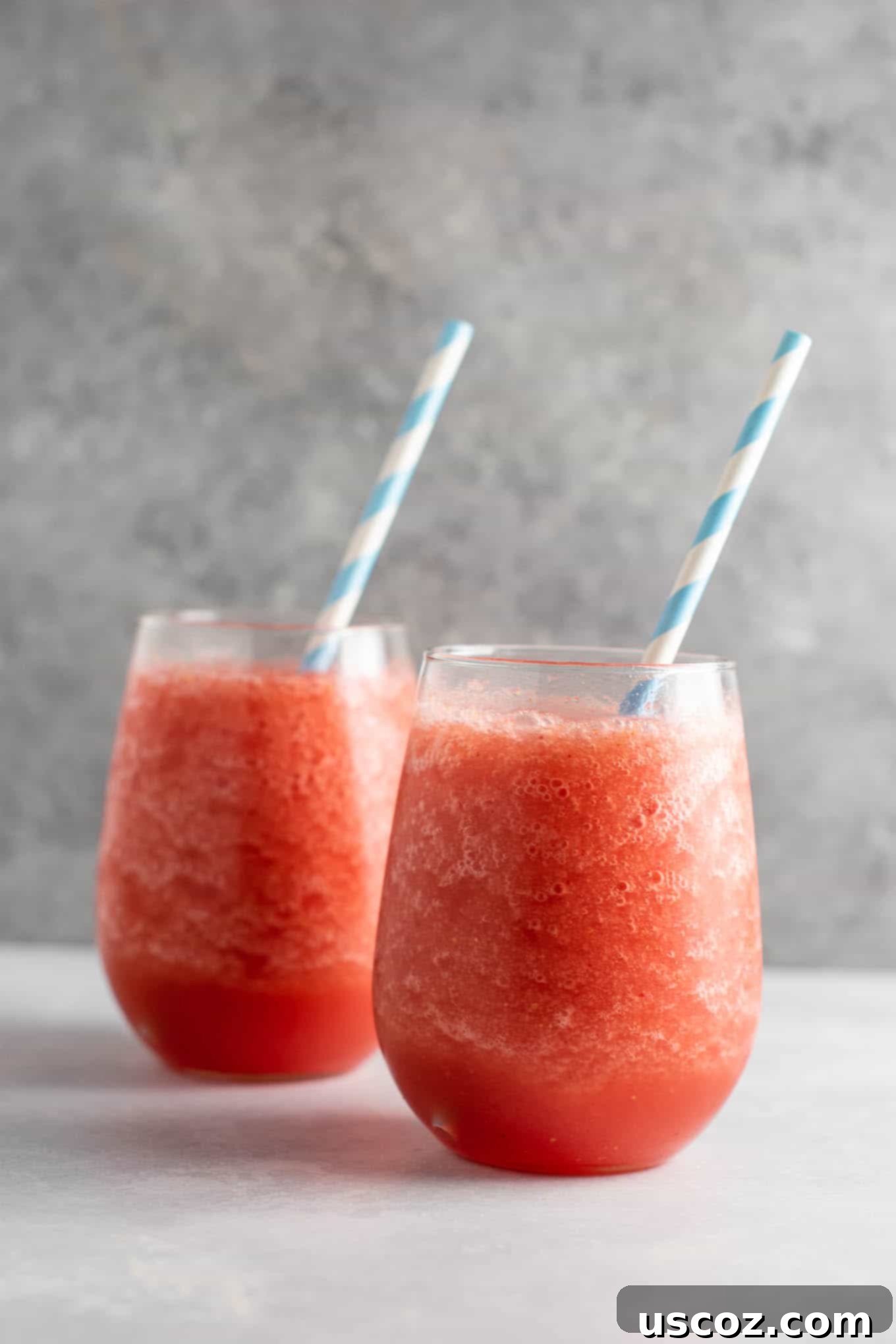 Three different types of watermelon drinks, including the white wine slushie, displayed together on a table.