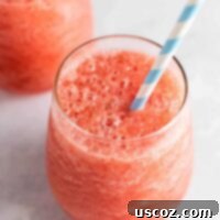Frozen Watermelon White Wine Refreshers 14 Close-up of a refreshing Watermelon White Wine Slushie in a glass, ready to be enjoyed on a hot day.