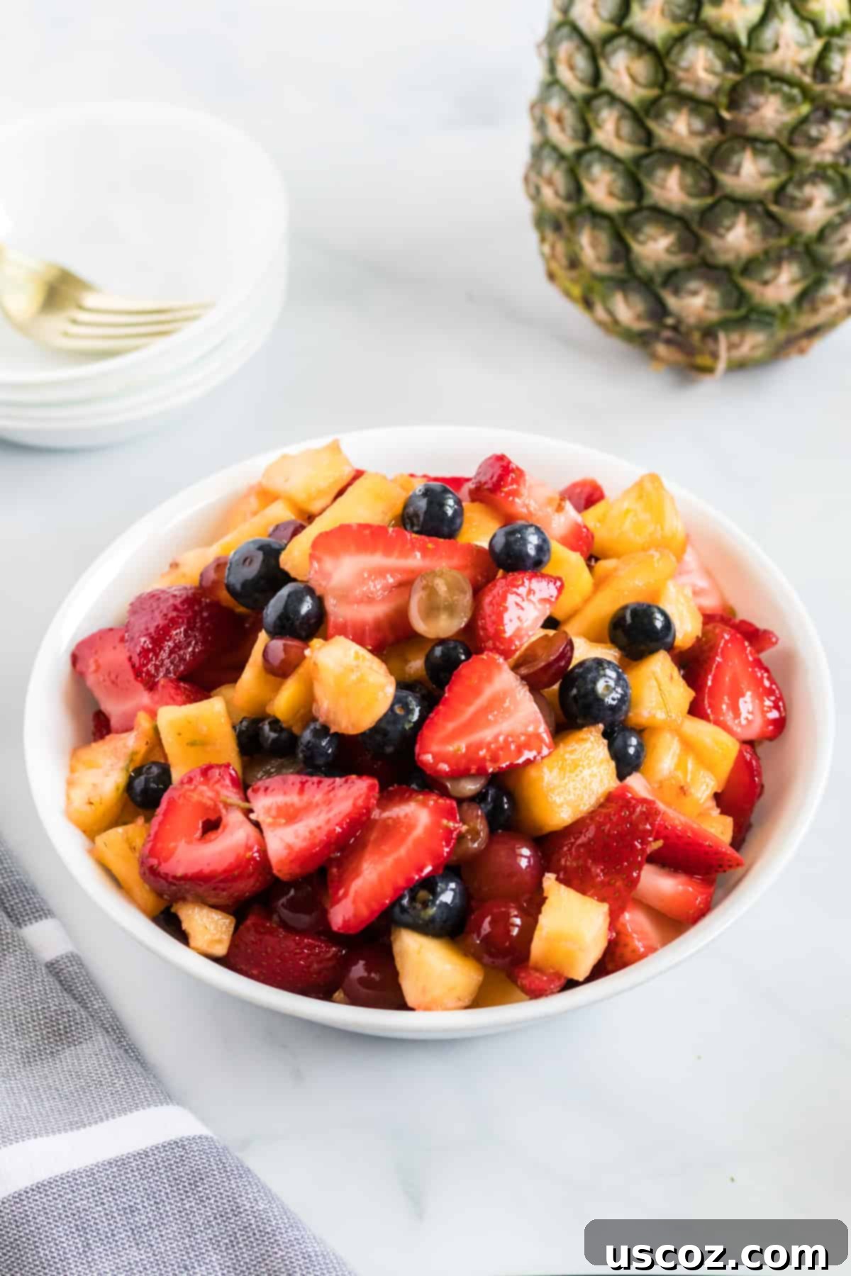 Vibrant Fruit Medley 2 fruit salad in a small white serving bowl