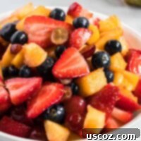 Vibrant Fruit Medley 10 fruit salad in a white bowl