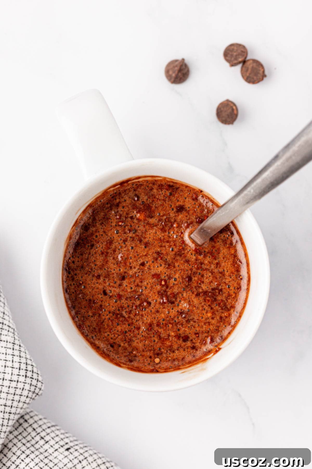High Protein Chocolate Mug Cake 7 stirring the mug cake ingredients together