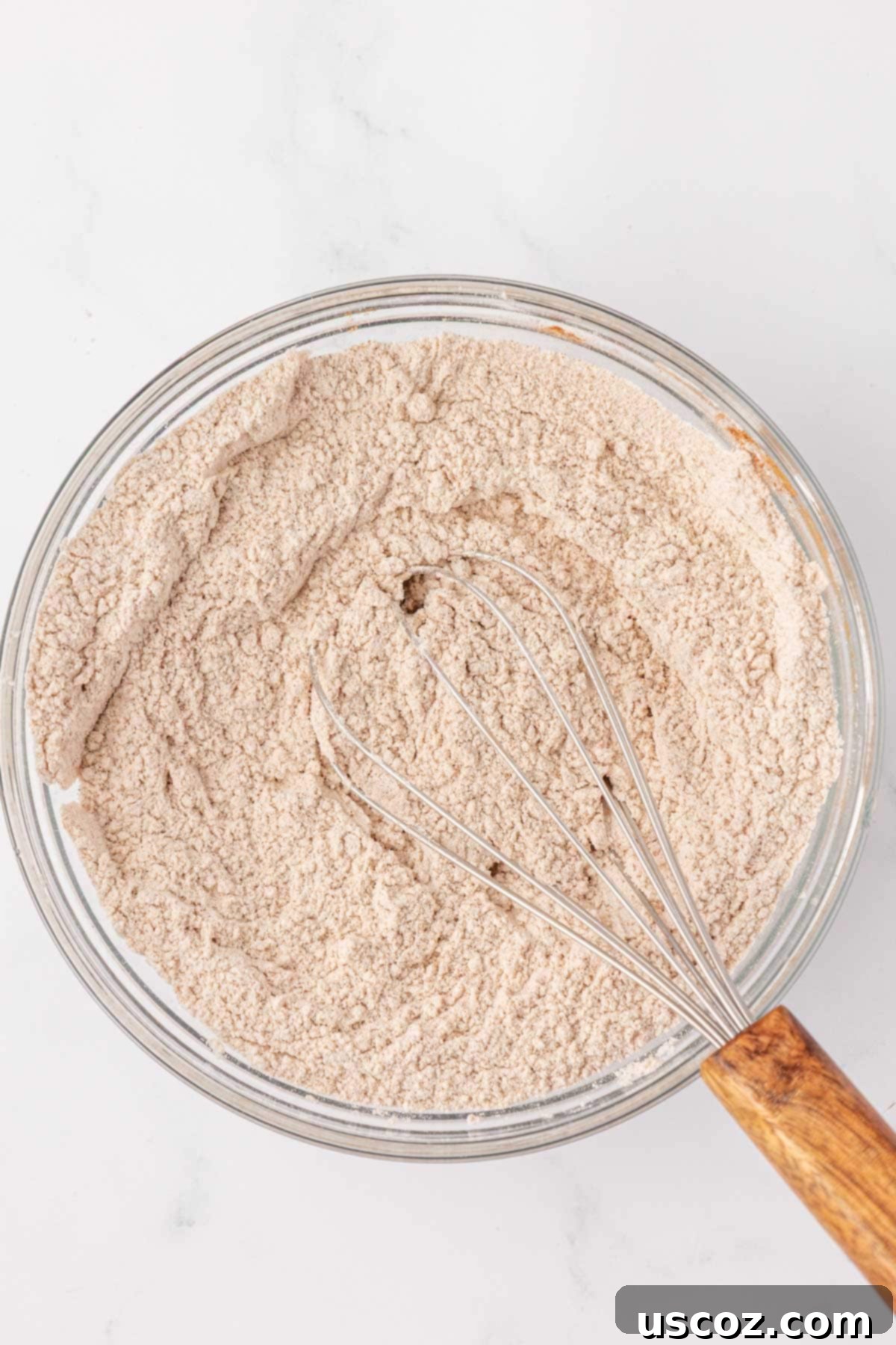 Dry ingredients for pumpkin bread thoroughly whisked together in a bowl