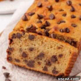 A round close-up image of a slice of Greek yogurt chocolate chip bread