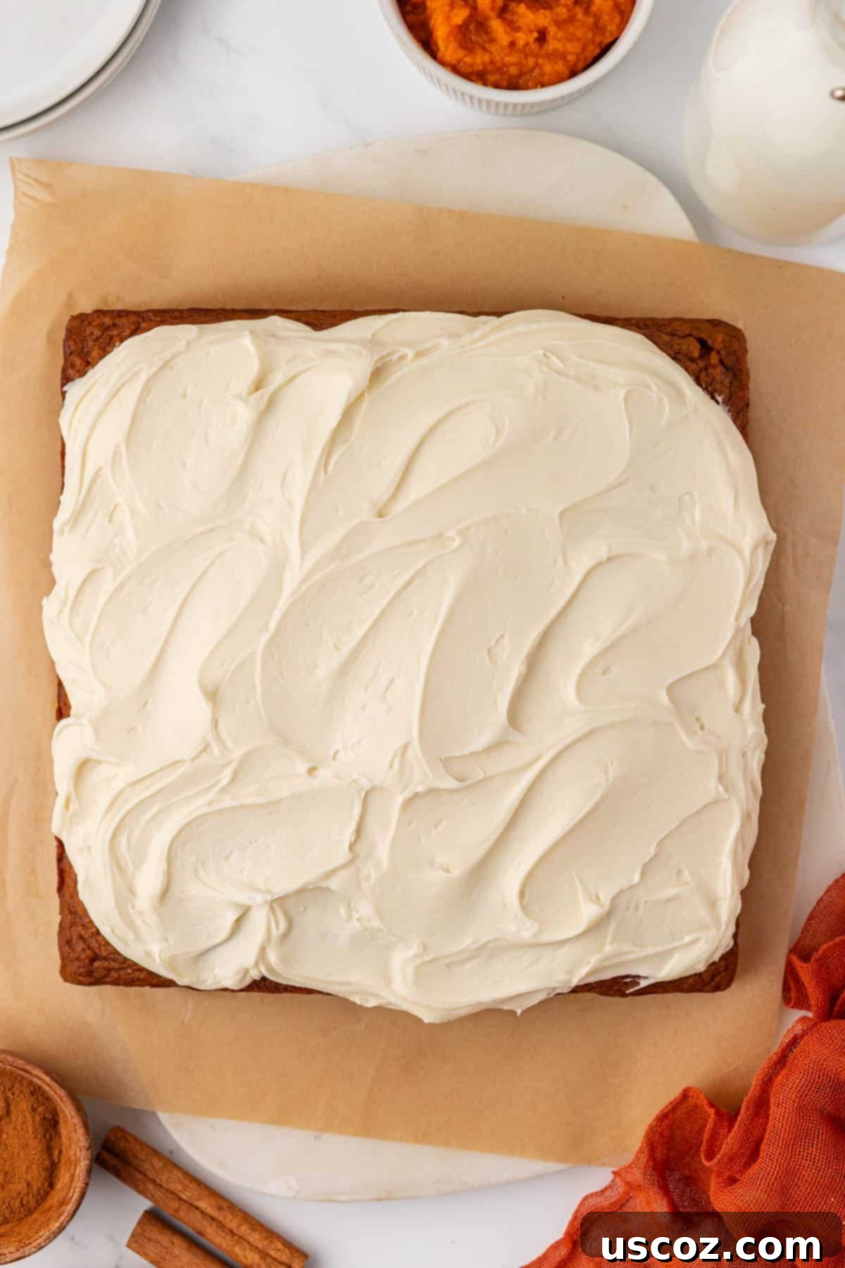 Pumpkin cake beautifully covered with creamy cream cheese frosting