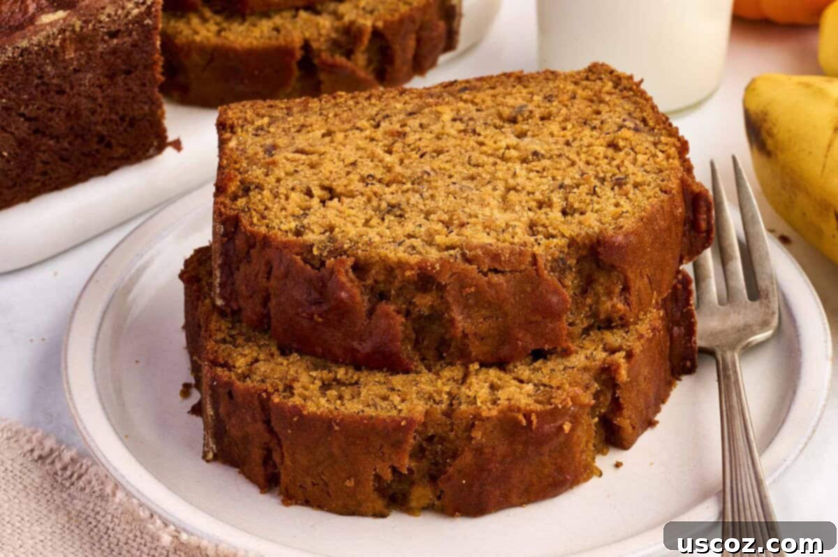 Slices of pumpkin banana bread on a plate, showcasing the moist texture and perfect crumb