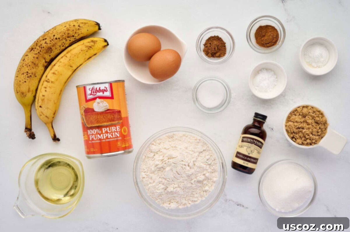 Ingredients for pumpkin banana bread arranged on a counter, showcasing the fresh and simple components