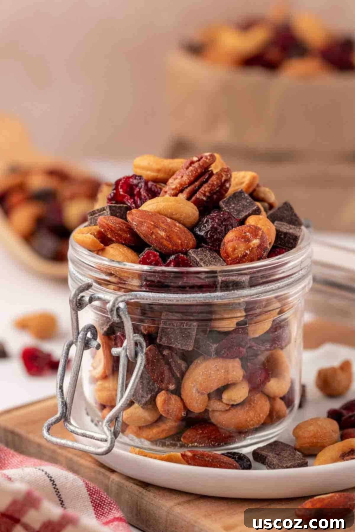 The Ultimate Guide to Crafting Your Own Trail Mix 2 Homemade trail mix in a glass jar