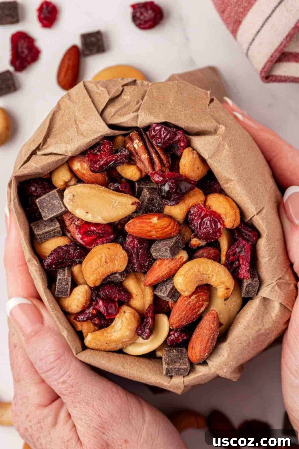 The Ultimate Guide to Crafting Your Own Trail Mix 10 Trail mix in a paper bag